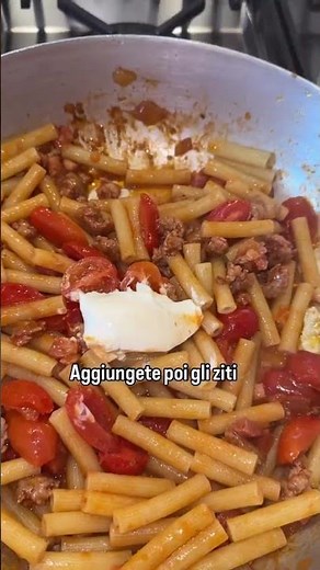 Mezzi ziti rigati with sausage, bacon, cherry tomatoes, and cream cheese!