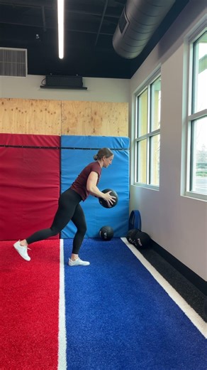 Medicine ball reaching single leg deadlift with hip flexion overhead reach