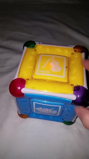 Munchkin Mozart musical magic cube toy orchestra instruments video