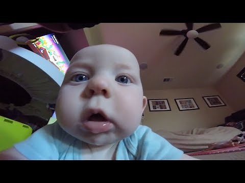 Baby eating camera