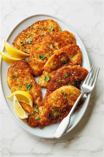 These homemade Italian Chicken Cutlets are crunchy and flavorful on the outside and juicy on the inside. Recipe: https://natashaskitchen.com/chicken-cutlets/ | NatashasKitchen.com