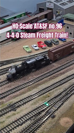 HO Scale AT&SF no.96 4-4-0 Steam Freight Train Passes Railyard & Backshop!