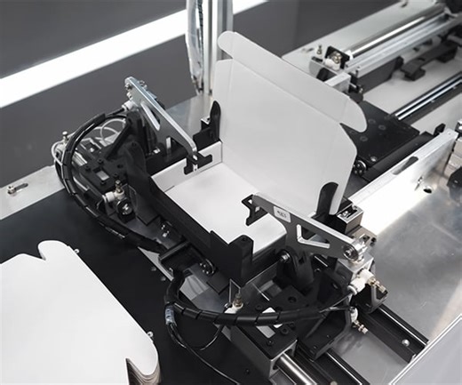 Watch This Homemade Machine Fold, Fill, and Close Boxes in Seconds