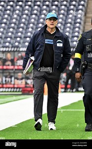 Los Angeles Chargers head coach Jim Harbaugh arrives prior to the game against the Houston Texans in an NFL football wild card playoff game, Saturday, Jan. 11, 2025, in Houston. (AP Photo/Maria Lysaker Stock Photo - Alamy