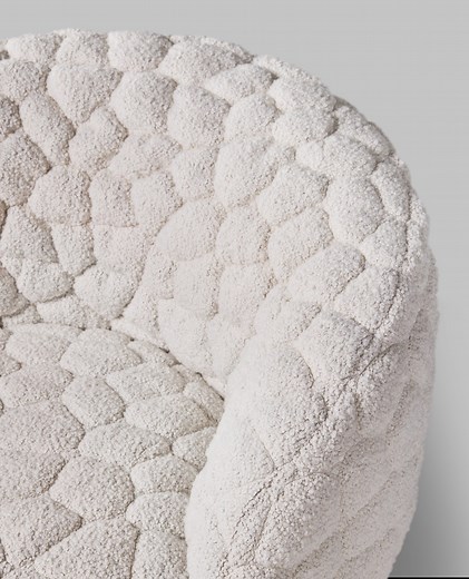 Moooi on Instagram: "Curved to cocoon. Padded to please. Wrapped in a tactile, woolly fabric that feels like kindness.⁠ Meet Introvert Chair by Robbie Williams for Moooi – part furniture, part sanctuary.⁠ Looks like art. Feels like therapy.⁠ ⁠ #Moooi #ALifeExtraordinary⁠ #IntrovertChair #RobbieWilliams #NewDesign #Armchair⁠"