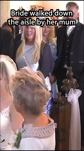 Bride Walks Down The Aisle With Her Mum