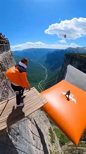 Orange “Anime” Cliff Airbag Jump 🟠😂 He Hit It Once… Then Started Bouncing Like a Ping-Pong Ball
