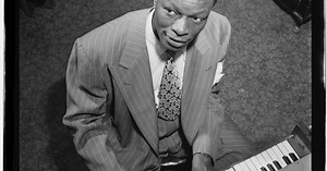 Nat King Cole sings “When I Fall in Love”
