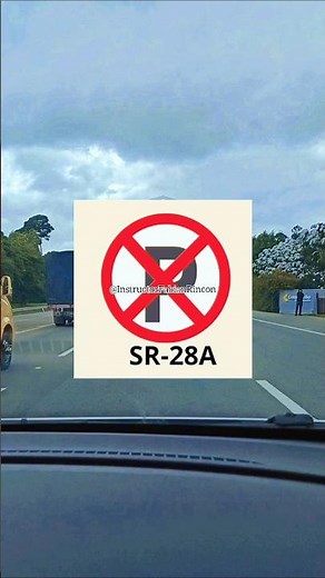 Traffic signs "No Parking SR28" and "No Parking and Stopping SR28A"