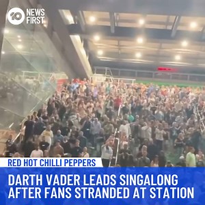 Red Hot Chili Peppers fans kept their spirits high last night, singing to the band's popular hits while stranded at the train station. Fans flooded to Southern Cross Station after the concert at Marvel Stadium to make their way home, but due to reports of no extra train services being added, there were huge crowds and long wait times. To entertain commuters, a man dressed as Darth Vader played songs such as "Under The Bridge" and "Otherside" on his guitar for the crowds to sing along to. | 10 Ne