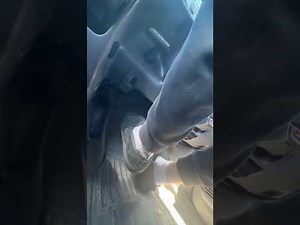 Floor Pedal View: Driving the Truck in Black Slip on Sneakers