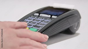 Swiping card through credit card terminal and printing receipt