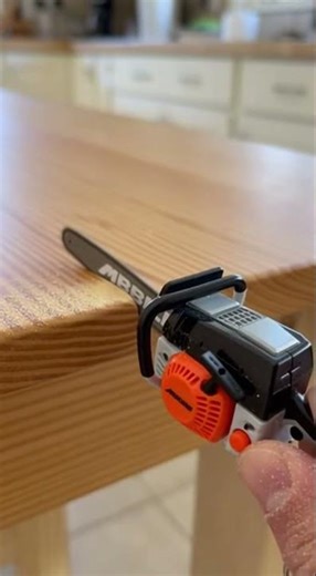 Mini Chainsaw Cuts the Corner Off a Kitchen Table