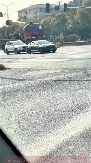 Truck with Rear Wheels Off Ground: Nearby Cars Are Terrified!