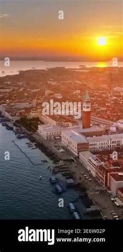 Aerial drone view of Venice Italy historic canals, architecture, bridges, and scenic cityscape.