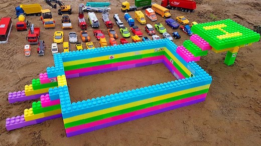 playing with his mega bloks first builders block scooping wagon. This is an amazing building blocks that you could get really creative with it with your children | Toy Car