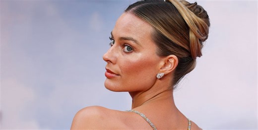 Margot Robbie Dons Gorgeous ‘Naked Dress’ On Red Carpet, But It’s Getting Some Backlash
