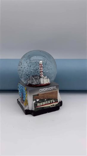 6.4K views · 17 reactions |  50% OFF Chernobyl Snow Globe – A deal that's radioactively good! ☢️  https://www.squattingslavs.org/collections/home-accessories/products/%E2%98%A2-chernobyl-graphite-snow-globe-pripyat-handmade | Scenic Depictions of Slavic Life | Facebook