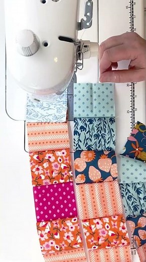 Chain piecing the center section of my Trip Around the World quilt