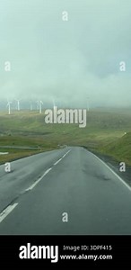 View of wind turbines generating electricity. Huge array of gigantic wind turbines spreading over the desert in Palm Springs wind farm, California