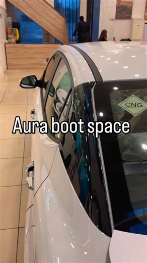 What's the boot space of the 2026 Hyundai Aura CNG after installing the CNG tank?#hyundai #yourcaradvisor #venue | Simranjeet Singh