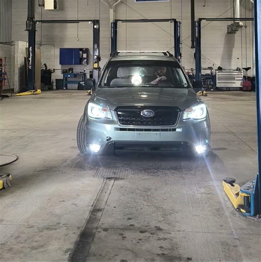 2014 Subaru Forester base model lowered on Silvers Neomax coilovers on sti wheels