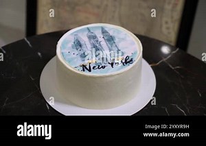 This stunning wedding cake features an elegant Mr Mrs topper and beautifully arranged flowers, making it the perfect centerpiece to celebrate love and