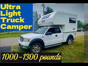 Ultra light truck camper: 1300 pounds. Sleeps 4 adults and fits midsize and full sized trucks.