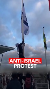 13K views · 724 reactions | Protesters in Rotterdam, the Netherlands, removed the Israeli flag and raised a Palestinian flag in its place to protest against Israel's actions and war crimes in Gaza. | A News | Facebook