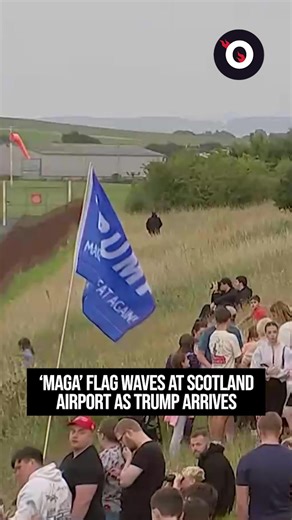 Trump Arrives in Scotland: MAGA Flag Waves at Airport