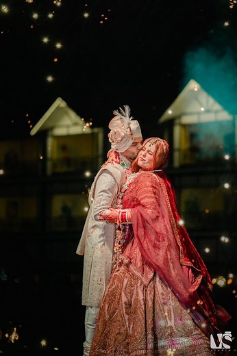 7.6K views · 361 reactions | On their varmala day, Aishwariya's graceful entry made Nishant's eyes fill up with happy tears. Their tears spoke of the deep connection between them as they garlanded each other, and Nishant sealed it with a loving kiss. They danced together, celebrating their love.Have you seen a better varmala than this ? | Surekha Bhargava | Facebook