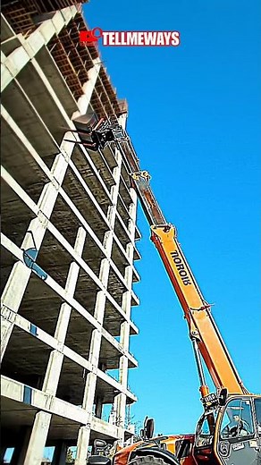 Step a Telehandler in Action Lifting Up and Out! ⬆️🛠️"*