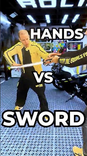 Tai Chi Bare Hands vs Real Sword — He Won