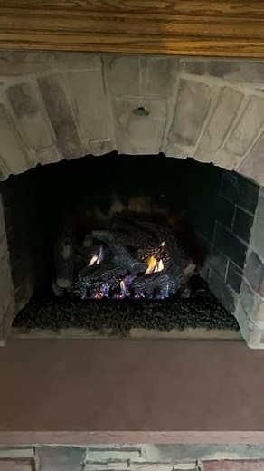 Ventless gas log set with a remote control