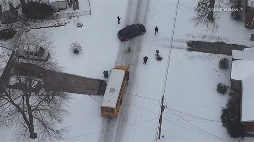 JCPS school bus stuck on icy Valley Station road