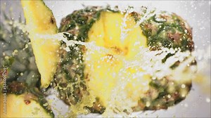 Super Slow Motion of Explosion Pineapple and Burst Juice and Slices
