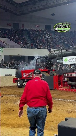 "Redweiser" pulling inside Freedom Hall at the 2025 National Farm Machinery Show Championship Pull!