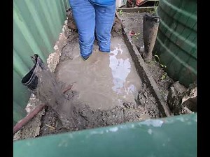 Nora Wellies stuck in a mud pit