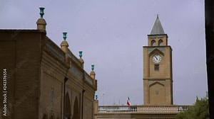 Side view of the top exterior of a building showing the roof and other parts of the building