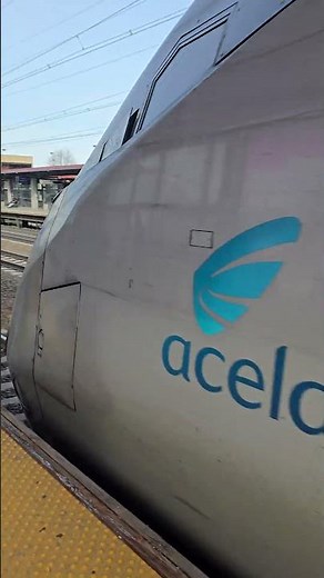 Amtrak Acela departs Metropark train station
