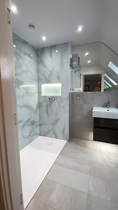 CRYSTAL STONES GLASS SHOWER SPLASHBACK 🚿 Shower surrounded by luxury with a shower that's clad in a unique glass design. This stunning 'Crystal Stones' design, created by CreoGlass, looks absolutely breathtaking in this bathroom. Not only are shower splashbacks beautiful but they're also: 🧼 Hygenic & Easy to Clean 🇬🇧 Manufactured in the UK 🔨 Made with Toughened Glass 📏 Custom Fit & Made to Measure Contact us for your custom quote today! See more: https://www.creoglass.co.uk/bathrooms/showe