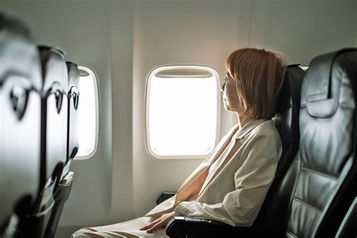 This Is the Most Comfortable Way to Sit on a Long-haul Flight, According to Healthcare Experts