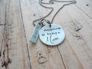 Found it on Etsy: Custom, Hand-Stamped Charms