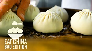 We know you’ve been waiting. Our new season of Eat China will be all about *drumroll* BAO! Go anywhere in China, and you’ll encounter the bao, a Chinese word that describes buns, dumplings—basically anything with filling wrapped in dough. There are so many different kinds of bao in China that you could do a whole series about it. And so we did. In this new 10-part season of Eat China, we’ll look at 10 different kinds of bao across China and show you how they’re made. Up first is xiaolongbao, Sha