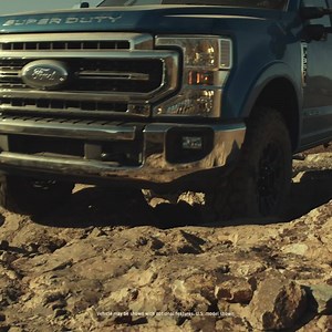 With available best-in-class water fording of 33 inches and the largest diameter tire available on a heavy duty truck, the road is long for the Super Duty Tremor. | Ford Canada