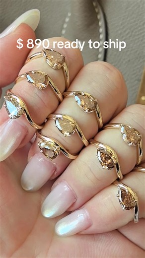 890 usd each for this 1 carat pear champagne diamond pinky ring #junolabshelley #champagnediamond #pinkyring