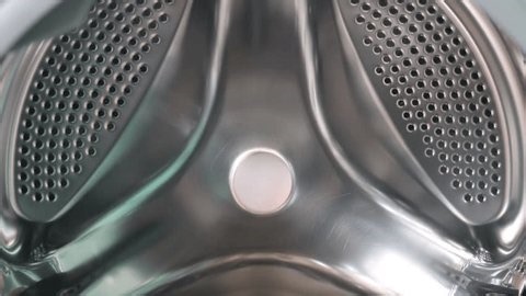 clip-4006505209-inside-empty-stainless-steel-washing-machine-drum
