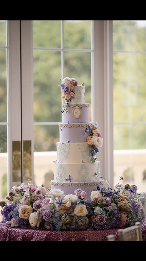 Quinceanera cake: The London Baker in Lewisville created this beautiful, six tier cake. When we met with then they asked Kristen what she would like for her cake to look like. Kristen wanted her cake to have her quince colors; light blue and lilac. She also wanted it to have butterflies on it and lace similar to her dress. The London Baker created it perfectly! For the cake flavors Kristen chose cinnamon roll, chocolate, strawberry, and london style. #isitcake #thelondonbaker #quinceañera #quinc