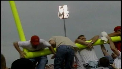 Football fans storm field, pull down goal post following Nebraska-Oklahoma game in 2000