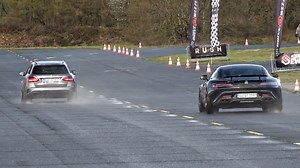 A slippery drag race between AMG C63 and AMG GTS
